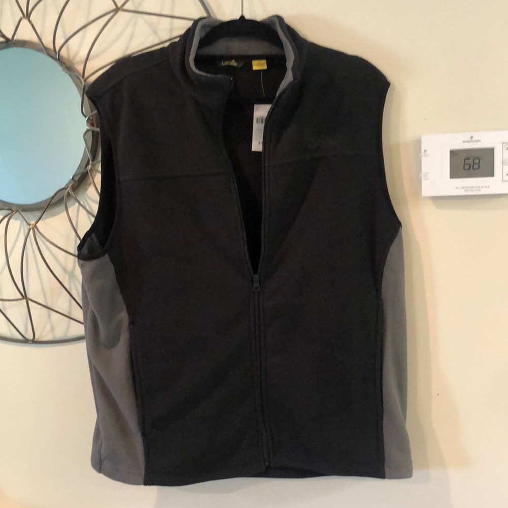 Black and grey Cabela’s fleece vest